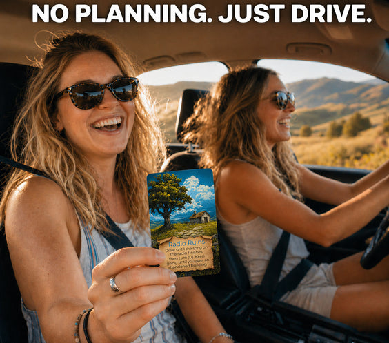 Two people playing Destination Unknown Rural Explorer in their car on a country road